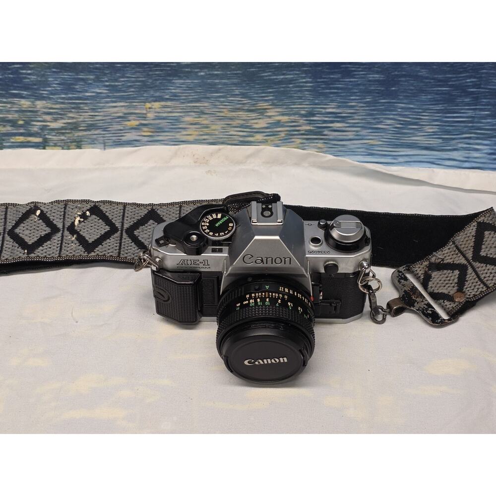 Canon AE-1 35mm SLR Film Camera with Canon 50mm f/1.8 FD Lens - NICE- With Strap